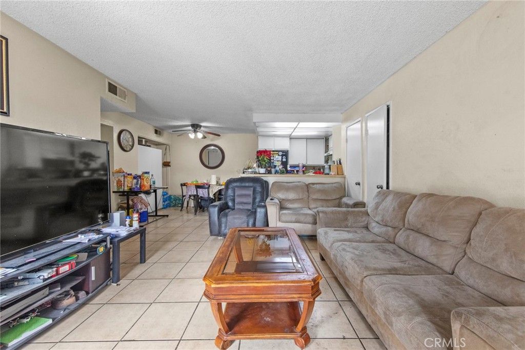 Photo of 25007 Peachland Avenue #120, Newhall, CA 91321 (MLS # SR26058654)