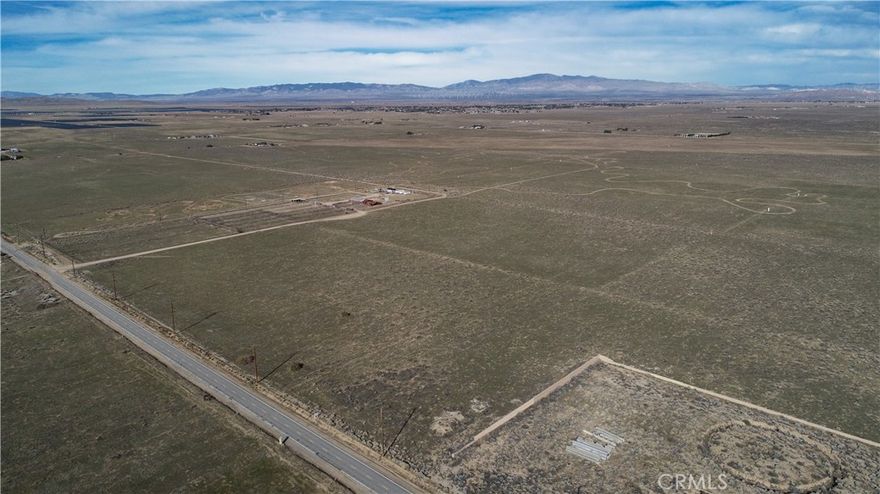 Developers! Investors! Here is a rare chance to purchase a Huge Lot with over 33 Acres of prime Industrial Land in the City of Lancaster, CA Fox Field Business Park. Located on paved Avenue H with power lines in the street, this parcel is ready to be turned into an amazing facility. Please call, email or text the Listing Agent with all questions.

Permitted Uses• Business Park
a. Offices - Business, Government or Professional.
b. Public safety facilities and services.
c. General manufacturing (refer to Section 241.021.9 of the City Municipal Code
[excludes cement manufacturing, explosives, foundries, paper manufacturing,
plastic manufacturing, or tanning of animal hides]).
d. Public services and utilities.
e. Research and development.
f. Warehousing, wholesaling, and related signage. 
g. Eating and drinking establishments (bars, cocktail lounges, nightclubs, or similar
uses which meet the definition of on-sale liquor establishments, shall be required to
obtain a conditional use permit.)
h. Financial institutions and services.
i. Retail/Commercial.
j. Repair services (excludes automobile, boats, or heavy equipment) - This is limited
to shoe repair, jewelry and watch repair, locksmiths and similar repair services.
k. Fairgrounds.
l. Services-business or personal - This category includes uses which may be classified
as support services for the business park. Examples include day care, dry cleaners
and laundries, florists, moving and storage, parcel delivery terminals, tailors,
barber and beauty shops, and health spas.
m. Other operations and uses which are neither specifically prohibited nor specifically
authorized by these restrictions may be permitted in specific cases if consistent with
the purposes and intent of the Specific Plan, and if approved by the Director of
Community Development. All uses must be conducted within an enclosed
building.
Buyer to confirm all property uses and utilities.