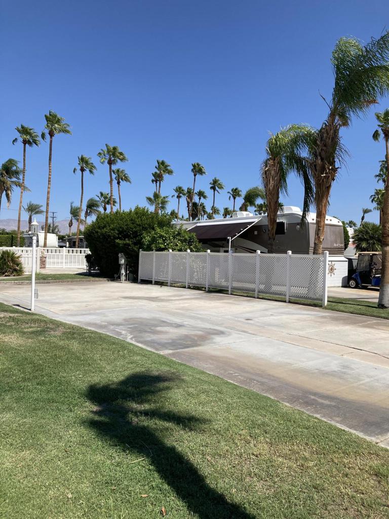This outstanding lot presents a unique opportunity for personalization. Situated in a prime location just steps to the pool, spa, laundry and full restroom facilities. Owners will appreciate the lot's close proximity to the front entrance, allowing for effortless entry and exit, while its strategic placement near La Palma clubhouse offers convenient access to a restaurant, gym and various indoor activities. Lot 65 also has a fairly large grassy area making ideal for pets.