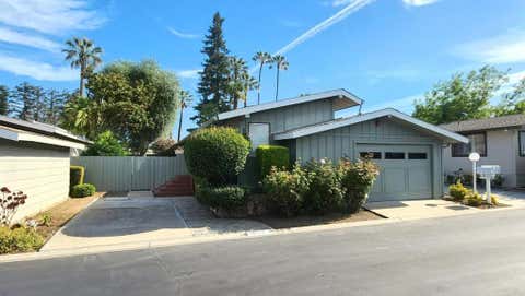Photo of 2896 Moss Hollow DR, San Jose, CA 95121 (MLS # ML82049615)