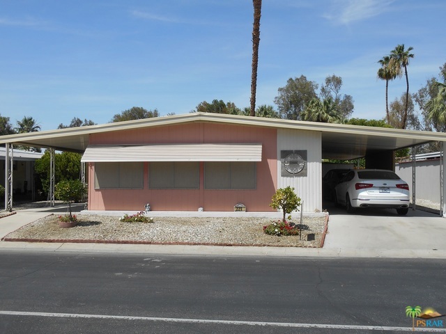 This 2 bedroom , 2 bath home features granite in the kitchen & bath, updated tiled showers are beautiful. Large living room, dining area with built-in china hutch, family room area with wood laminate flooring, ceramic tile in kitchen. Room for 2 cars under carport. 4 sheds, citrus trees. Date Palm Country Club is a 55+ Gated community with an 18 hole Executive Golf Course, Tennis Courts, Pools, several Clubhouses, Fitness Center. An Active Adult community. Furnishings available. Seller says make an offer !!