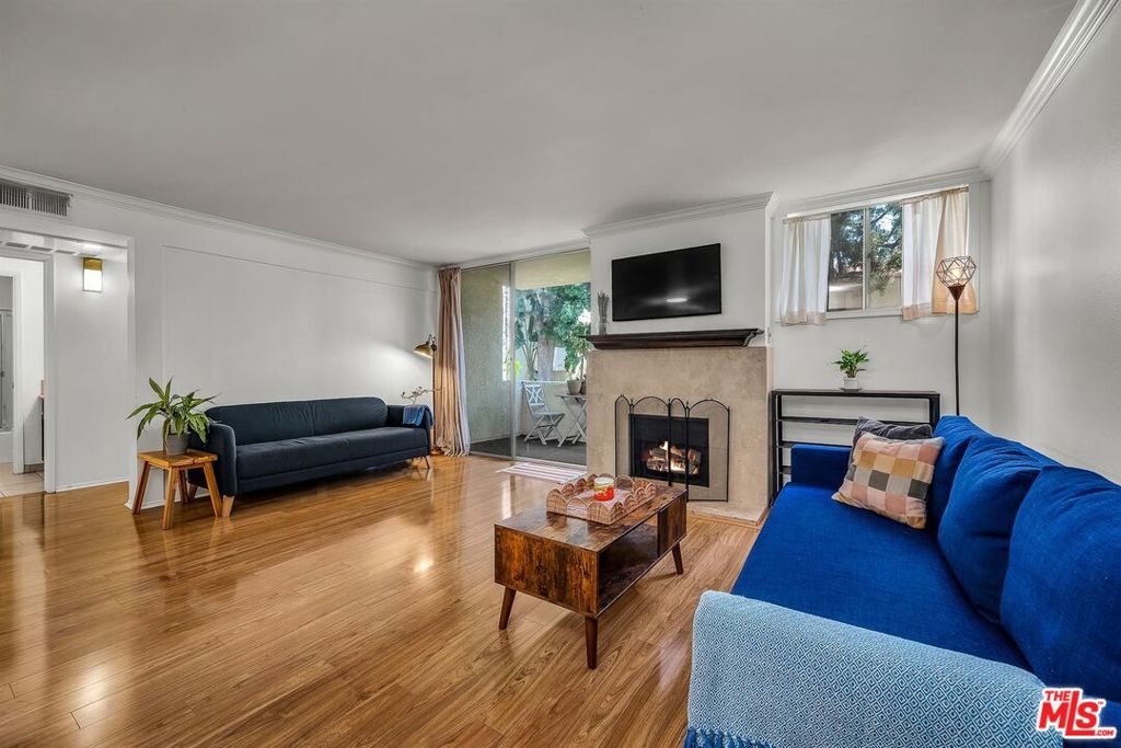 Welcome to your new home at 5325 Newcastle Ave, Unit 223, Encino, where comfort meets convenience in this charming condo. This spacious ~809-square-foot residence offers two bedrooms and one bathroom, making it an ideal space for those seeking modern living in a vibrant community. Step inside to discover the inviting interior featuring laminate wood floors and carpet that create a seamless flow throughout the home. The living room showcases a cozy fireplace, perfect for relaxing evenings. The kitchen is a chef's delight, equipped with a breakfast bar, dishwasher, refrigerator, stove, and granite counters, making meal preparation a breeze. Enjoy your morning coffee or unwind after a long day on your private patio, a serene outdoor retreat. (Added bonus of storage closet on the patio.) The building offers an array of amenities, including billiards, recreation room and a gym, truly resort-like living. Take advantage of the heated pool, or host a barbecue in the designated outdoor area. For your convenience, laundry facilities with newer machines are available, and parking is a breeze with assigned parking with controlled access and guest parking options as well. HOA fee includes water, gas & trash. This condo at 5325 Newcastle Ave offers a blend of comfort, style, and amenities, all in a prime Encino location. Don't miss this opportunity to call it your own!
