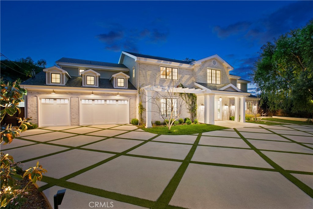 Do not contact Sellers, property is still listed. Nestled on a sprawling 31,685 sq ft lot in a prestigious south-of-the-boulevard Encino neighborhood, this grand estate masterfully combines traditional charm with contemporary luxury. A striking two-story entry welcomes you into an expansive dining room, leading to a sun-drenched kitchen and family room, all seamlessly flowing to a covered patio, pool, extensive lawns, sports court, and outdoor decks—ideal for both relaxation and entertaining. The main floor boasts a luxurious tiered screening room, a stately paneled library/executive office, a spacious guest bedroom, billiards room, butler’s pantry, powder room, and one of two convenient laundry rooms. Upstairs, the opulent primary suite features a private living room with a fireplace, a bedroom with cathedral-beamed ceilings, a generous terrace overlooking the grounds, a spa-like marble bath, and dual walk-in closets. Three additional grand en-suite bedrooms and an airy family room complete the upper level. A detached guest house offers a cozy living room, kitchenette, lavish bathroom, and a private bedroom—perfect for guests or staff. The expansive rear grounds are an entertainer's dream, with a BBQ and bar area, vast lawns, and a versatile sports court ideal for pickleball, basketball, roller skating, or large gatherings, all centered around a stunning pool and spa accented with arching fountains. The home is set back from the street, offering privacy and a double-gated circular drive with ample parking, including a cathedral-ceilinged 3-car garage with built-in storage. A separate, secured gate provides vehicle and catering access to the rear yard. With exquisite designer finishes, smart home technology, and impeccable craftsmanship throughout, this estate offers the highest level of luxury living.