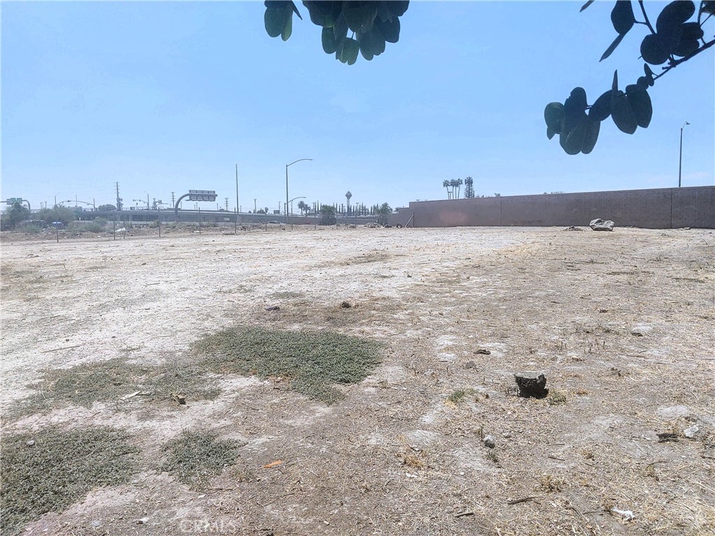 Prime land! Excellent location!! lot of potential, this is your opportunity, zoned light industrial, close to the corner of H and Baseline, perfect location for investors, put a Business and Advertise on the side of 215 Freeway, Buyer to Verify Utilities, Boundaries, Access and Zoning.