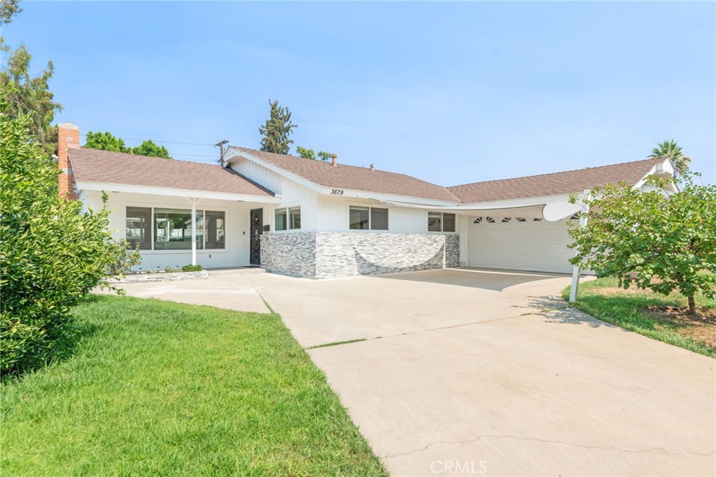 Welcome to this stunning 4-bedroom, 2-bathroom home on a spacious 10,000+ sqft lot at the end of a quiet cul-de-sac in one of Riverside’s most sought-after areas. From the moment you arrive, the charming curb appeal and fruit trees will invite you in.
Step inside to discover the natural light-filled interior with large windows and recessed lighting. The living room features a cozy fireplace, perfect for relaxing evenings. The beautiful kitchen features quartz countertops, white cabinetry, and stainless steel appliances.
One of the bedrooms includes built-in shelves, ideal for an office or study. The primary suite is a true retreat with a closet organizer and a spa-like bathroom featuring heated floors, a walk-in shower, and a sliding glass door. Both bathrooms offer elegant finishes and functional layouts.
Enjoy durable and stylish LVP flooring throughout, offering both beauty and easy maintenance. Outside, the large backyard boasts fruit trees, newer vinyl fencing, and a covered back patio with ceiling fans—a perfect space for entertaining or relaxing.
Located just minutes from the 91 Freeway shops and schools., this home offers convenience and comfort in one package. Don’t miss your opportunity to own this exceptional Riverside home!