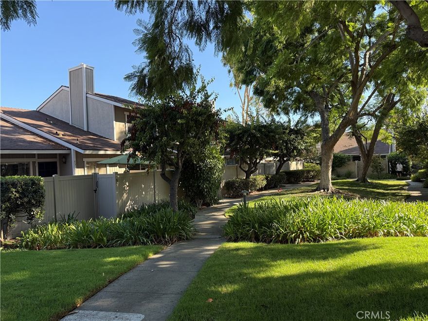 Great location in the beautiful gated Greentree Condominium community filled with lush landscaping, tree lined paths. This condo is in a desirable location of the central community without any buildings block the charming landscape view. The living room full of soft carpet and offers plenty of space and has a gas logged fireplace. The dining area, kitchen and bathrooms all have automatic lighting that easy to make the room bright when you enter during the night. The bedrooms are in big size and spacious with abundant closet space and mirrored doors. On the second floor there is a big size bedroom with two sides wall closet. The large master bedroom has vaulted ceilings, walk-in closet. The upgraded HVAC system and a Whole House Fan are a plus for summer hot days. The three bedrooms are equipped with ceiling fans. Oversized two-car garage easily fits two full-sized cars. The laundry space in the garage. The Greentree has a community Pool with 24 hours hot Spa. This location is great super close to shopping, easy access to 57 and 91 freeway, also close to CSUF.