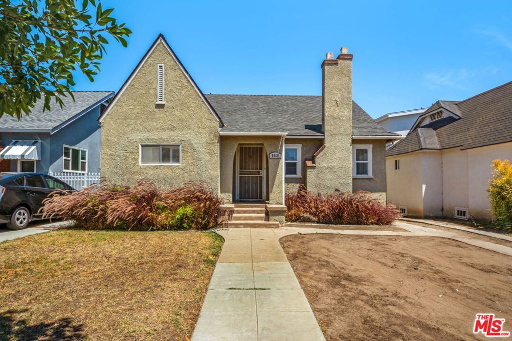 Set behind a generous front lawn on a peaceful, tree-lined street, this 2 bed, 1 bath single-level gem blends timeless character with modern comfort. Step through the arched entryway and into a light-filled interior featuring original wood floors, a Batchelder-style decorative fireplace, and a dedicated dining room perfect for everyday meals or special moments. The home's smart layout places two spacious bedrooms privately on either side of a full bath, creating a restful retreat on one wing while the main living, dining, and kitchen areas are set up perfectly for entertaining on the other. And outside? That's where the magic continues. The huge backyard is an entertainer's dream with mature orange and lemon trees because really, why go to the farmers market when you can pick citrus right at home? Whether you're hosting summer gatherings, gardening, or envisioning a future pool (buyer to verify), there's room to dream big here. Additional highlights include a detached 1-car garage and a sizeable storage room ready to be reimagined for your needs. Located in a friendly, walkable neighborhood, just minutes from parks, eateries, shopping, SoFi Stadium, freeways, and public transit, this is a special find in one of L.A.'s most charming pockets. This home offers Timeless curb appeal, smart layout, and sunny outdoor vibes don't miss this Park Mesa Heights beauty