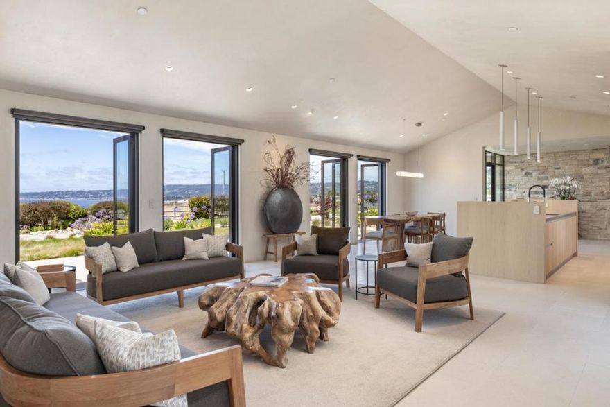 Carmel Coastal Retreat Beside Sea Star Ranch - Set along the Pacific with panoramic ocean vistas, this brand-new modern masterpiece designed by Mary Ann Schicketanz, offers an unparalleled lifestyle rooted in nature and refined in design. Adjacent to Sea Star Ranch, an acclaimed equine sanctuary, this home is a sanctuary unto itself. Glass French doors open to and invite in the seascape, while an open-concept layout flows effortlessly from indoor luxury to outdoor serenity. Highlights include a designer kitchen with top-tier appliances, a serene primary suite with a private ocean-view terrace and spa-like bathroom with sauna, and multiple guest suites for hosting. Smart technology and sustainable features blend seamlessly with timeless coastal aesthetics. Whether a private escape or a full time retreat, this home offers connection to land, sea, and self and just minutes to hiking, beaches, world renowned restaurants and everything downtown Carmel-by-the-Sea has to offer.