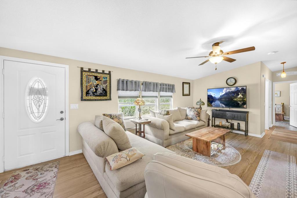Welcome to this beautifully maintained single-level manufactured home in the 55+ manufactured home community of Desert Sands. Built in 2006, this home is located in the newer home division of Desert Sands. It features new appliances, installed between 2018 and 2021, and includes an extra-large central AC unit. The living room flows into the dining area, and the kitchen features white cabinetry, stainless steel appliances, a center island, and a cozy breakfast nook surrounded by windows. This property includes two bedrooms plus a versatile bonus room that is ideal for a home office, hobby space, or guest area. The primary suite has an en-suite bath with dual sinks, and the secondary bedroom is serviced by a full guest bath. Enjoy the convenience of an attached garage and a spacious backyard with a covered patio, perfect for relaxing, dining, or entertaining. Desert Sands Mobile is known for its lush, year-round green landscaping, and vibrant community lifestyle. Community amenities include a pool, spa, and year-round activities. The location is superb! close to Eisenhower and Desert Regional hospitals, Palm Springs, Rancho Mirage, Palm Desert, and the airport. Don't miss the opportunity to make 1311 Via Playa your home sweet home!