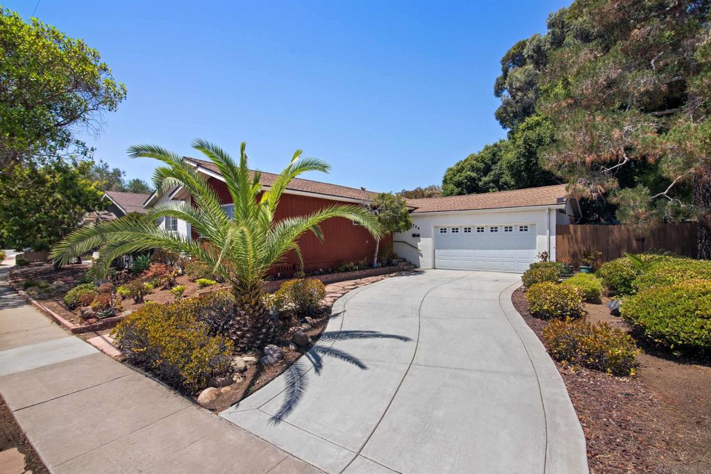 Tucked into a central San Diego neighborhood, Raejean Ave presents a refined framework—a blank canvas for the next owner—featuring three bedrooms, two baths and an oversized family room crowned by vaulted ceilings that amplify the home’s entertainer-friendly scale. The fully updated kitchen balances elegance and utility with granite countertops, custom cabinetry and a center island built for both prep and gathering, while paid-for solar adds modern efficiency and lowered operating costs. The backyard unfolds like a manicured jungle, where two full-size trees and lush plantings frame an outdoor bar and an oversized Jacuzzi tub, creating a private, resort-caliber setting for entertaining or quiet retreat. Centrally located, the property offers easy access to major freeways, premier dining and cultural attractions, with beaches and popular destinations reachable within a 15-minute drive. 8724 Raejean Ave — Spacious 3BR/2BA home featuring an oversized family room with vaulted ceilings and a fully updated kitchen with granite countertops, custom cabinetry and center island. Owned solar, plus a backyard oasis with two full-size trees, lush plantings, outdoor bar and oversized Jacuzzi tub — ideal for entertaining; centrally located with major employers, dining, attractions and beaches all within a 15-minute drive.