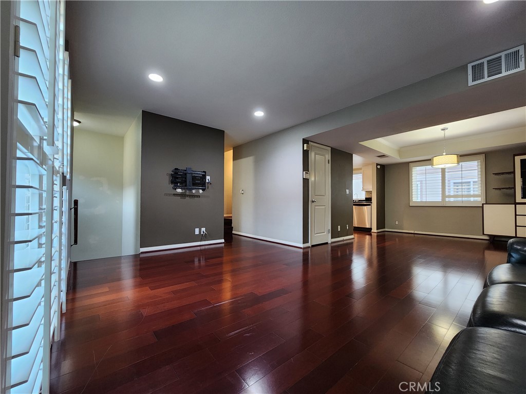 Affordable Townhome perfectly situated within a highly desirable & convenenient location in Arcadia. Within the excellent award-winning Arcadia Unified School District, this 3 Bedroom/ 2.5 Bath townhome was partially remodeled and offers upside potential at an excellent value. The kitchen and bathrooms feature matching granite counter tops, plenty of cabinetry, custom plantation shutters throughout, recessed lighting, and laminate wood flooring. As you enter the front door, a spacious living room and dining area provides an open space to enjoy privacy, relaxation and/or entertain guests. The bright living room offers glass sliding door access to own private low maintenance patio. Upstairs Bedrooms include (1) en-suite bedroom having its own bath & walk-in closet. Attached 2-Car Garage at bottom level, with upgraded Epoxy flooring, cabinets, and laundry hook-ups. The Shops at Santa Anita, Santa Anita Park, Trader Joe's, Arcadia Golf course, Arcadia Schools & library, and so many tasty restaurants & retail amenities nearby! Low HOA fee $195/per month includes water, trash, HOA building exterior, fire & liability insurance policy and common area maintenence. HOA already renovated newer windows & newer Roofing for entire community. 1st time on market in 15 years, Homes rarely become available within this well-kept Bonita Garden community - Nice opportunity to customize this charming townhome, create new memories and enjoy a peaceful place to call "Home".