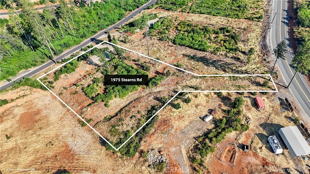 Almost 2 acres and nestled within the canyon, but still centrally located in Paradise, this property gives you some amazing views and already has a concrete driveway, retaining wall, and good septic, (septic inspection on file). The level building site was once a 3016 sq. ft. 3 bed/3 bath home. The Paradise Irrigation District water account is active. If you are looking for a secluded place to build your next home with some great views, you definitely want to check this one out.
