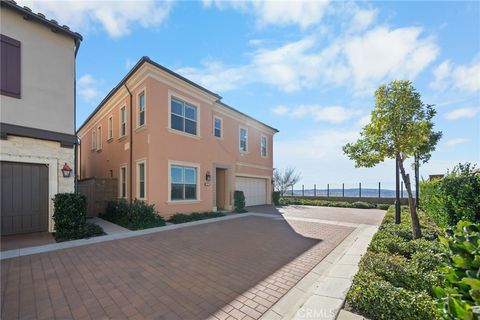 Photo of 137 Trumpet Flower, Irvine, CA 92618 (MLS # SR25273531)