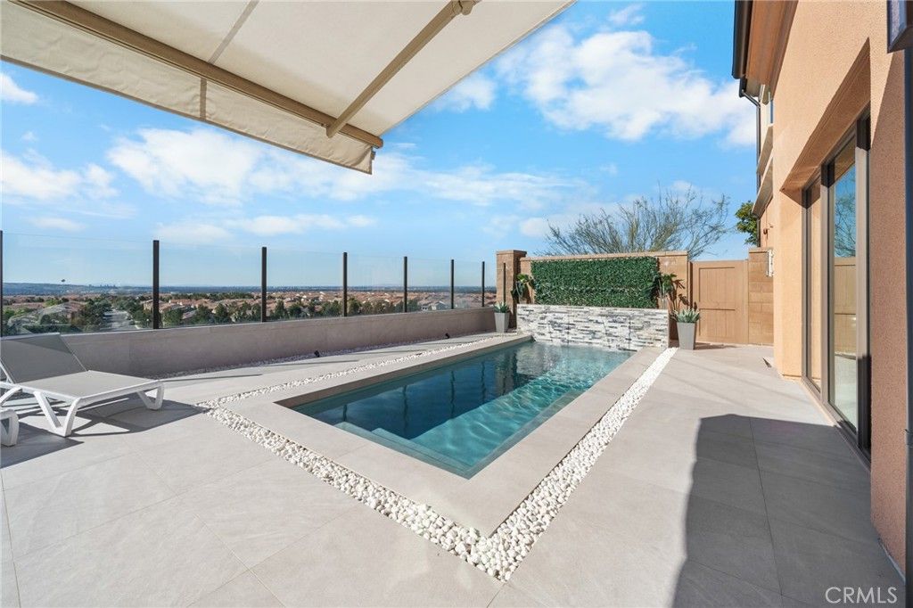 Photo of 137 Trumpet Flower, Irvine, CA 92618 (MLS # SR25273531)