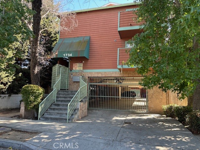 Profit-Driven Investment Opportunity at 1734 E. Erie St., Long Beach. This well-maintained and professionally managed 7-unit property, built in 1987, features an efficient and desirable unit mix of five 2-bedroom, 2.5-bath townhouse-style residences and two sizable 1-bedroom, 1-bath units, ideal for capturing a broad tenant base and strong rental demand. Recent capital improvements, including a brand-new roof and completed balcony inspection with repairs, significantly reduce near-term expenses and provide investors with stability and predictable cash flow. Tenants will enjoy seven covered on-site parking spaces in a private, gated garage, a premium convenience in Long Beach. Nestled in the residential Alamitos Beach neighborhood , the property is just blocks from Carrol Park and Alamitos beach, offering easy coastal access. Estimated walking or biking time to the waterfront is likely under 10 minutes, making it highly appealing for tenants seeking a beach-adjacent lifestyle. The location also delivers vibrant urban convenience just minutes from the boutique restaurants and eclectic shops along Retro Row and 4th Street. Situated within a charming neighborhood primarily composed of single-family homes, this offering combines tenant lifestyle appeal with consistent, long-term rental demand and strong appreciation potential.