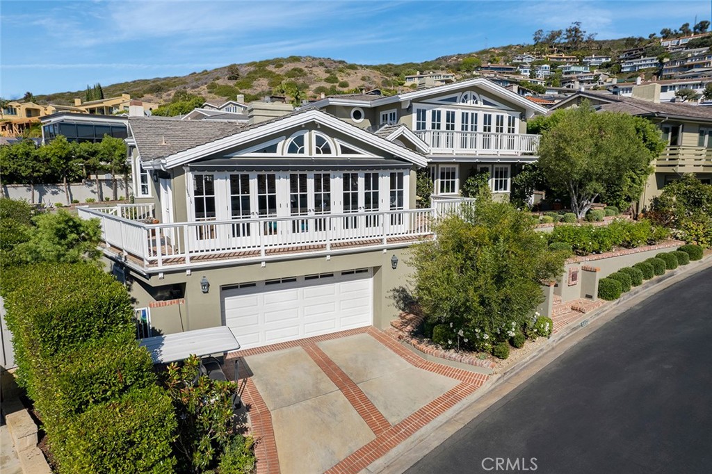 This beautifully furnished 4-bedroom, 5-bathroom custom home is available for lease at a special winter rental rate. Located in the exclusive Emerald Bay community, this residence sits at the entrance of a peaceful cul-de-sac, offering both privacy and a family-friendly setting. Enjoy breathtaking views of the Pacific Ocean from the living room, primary suite, upper-level deck, and private outdoor patio. The main level features a formal living room, separate dining area, and a chef’s kitchen that opens to a cozy family room and breakfast nook—creating an ideal space for entertaining. Three spacious bedrooms are located on the main level, along with a versatile den where you can lounge and catch up on your favorite TV shows. Upstairs, the private primary retreat offers a fireplace, ocean-view balcony, walk-in closet, and a luxurious en suite bathroom. The lower level includes a large bonus room, perfect for movie nights or gatherings. This space can easily be converted into an additional sleeping area, if desired. Also on this level are a full bathroom, laundry room, and direct access to the garage. Every detail of this home has been thoughtfully designed—from the layout and finishes to the furnishings and lush outdoor garden. The tranquil patio is perfect for relaxing while taking in the ocean views. Don’t miss this opportunity to experience the best of coastal living in Emerald Bay. Schedule a private tour today!