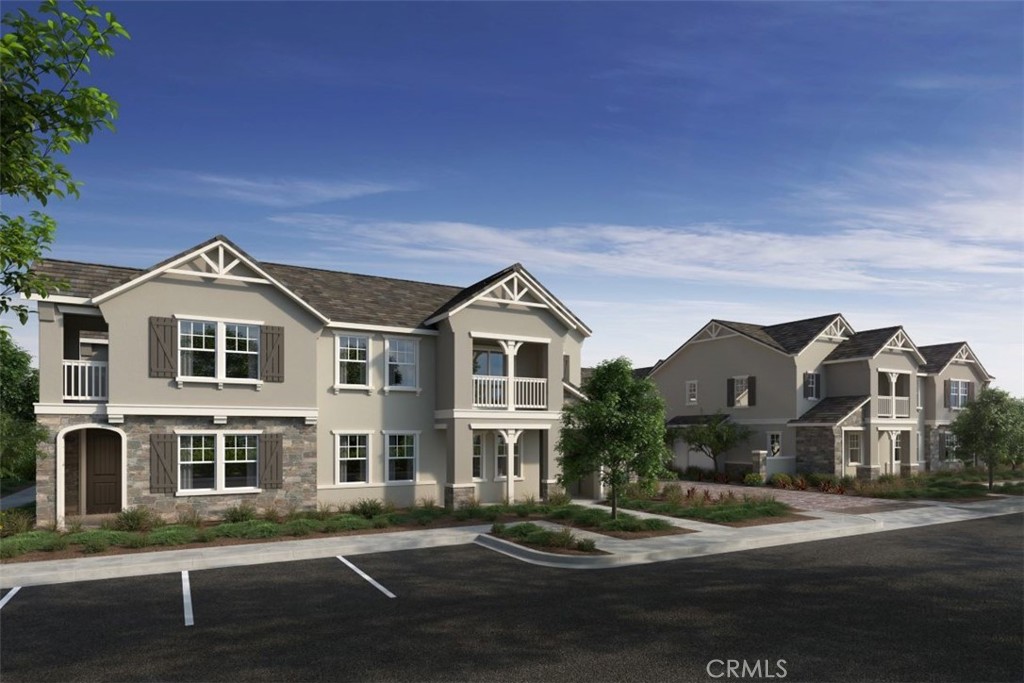 Belmont community is a beautiful brand-new resort-style community in South Ontario. This floorplan offers an open 1,193 sq/ft floor plan with expansive 9-ft ceilings and a bright and airy feel that is offered by walking distance to community pool and guest parking. The stylish kitchen features stylish shaker style cabinets, an expansive kitchen island, with a stainless large bowl sink, dining area, quartz countertops. Our homes offer brand-new Whirlpool® stainless steel gas cook top with oven, dish washer and out-side vented microwave. Additionally, there is convenient guest suite downstairs with full bathroom. The upstairs lead to a spacious primary bedroom,open concept kitchen and balcony for outdoor living. The exterior of the home has water-efficient front landscaping beyond the private patio. The energy efficiency of our Energy Star® certified home is complemented by an eco-friendly SunPower® solar energy system (included) Additional eco-friendly features are Smart thermostat, and dual-pane, low E glass windows to help ensure uninterrupted comfort all year long. Future community amenities include two parks, pool and spa, dog park, and pickleball courts. There is easy access to I-15, I-10, and 60 Freeways. You are also close to shopping at Costco®, 99 Ranch Market & Cloverdale Marketplace and Eastvale Gateway. The Ontario International Airport and Ontario Mills Mall are a short drive away. Moonstone is also just 2.5 miles from the brand-new Park View elementary school. Solar included, washer and dryer included!!!!!!
Photo is a rendering of the model. Solar Included