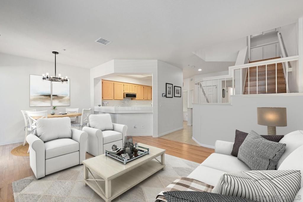 Photo of 11368 Via Rancho San Diego #E, El Cajon, CA 92019 (MLS # 250042359SD)