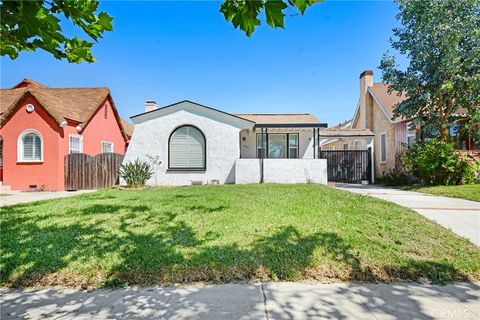 Photo of 7422 Brighton Ave, Los Angeles, CA 90047 (MLS # DW26076154)