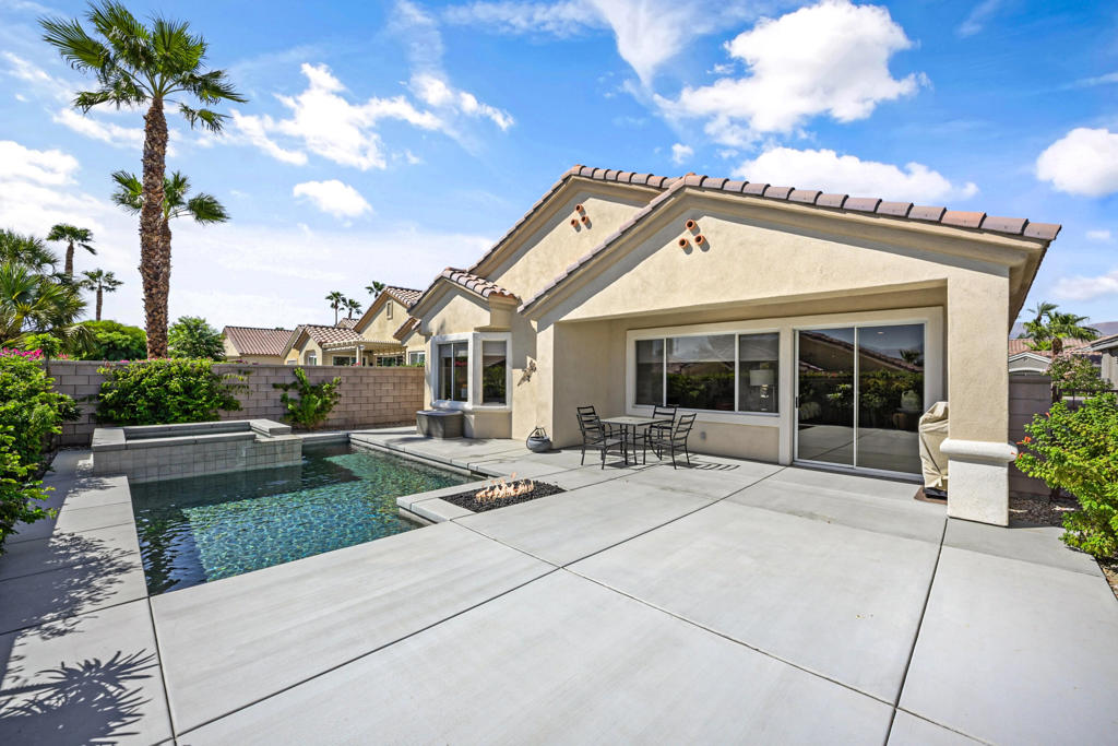 Modern, fresh, and stylishly upgraded! This reimagined St. Maarten floor plan in Sun City Palm Desert has been fully renovated, offering 1,680 sq. ft. of bright, open living. Expansive windows and polished concrete floors set a sleek, contemporary tone throughout. The kitchen is a true centerpiece, showcasing quartz counters, a designer backsplash, stainless steel appliances, a center island with bar seating, and ample cabinetry--flowing seamlessly into the dining area and living room anchored by a cozy fireplace. The spacious primary suite is filled with natural light and features dual vanities, while the guest bedroom, full bath, and versatile den/office with barn door provide flexibility for visitors or work-from-home living. Step outside to your private retreat with sought-after southern exposure, stunning mountain views, and a sparkling pool and spa framed by low-maintenance landscaping--perfect for effortless entertaining or tranquil relaxation under the desert sky. Residents of Sun City Palm Desert enjoy an unmatched lifestyle with two championship golf courses, three clubhouses, two fitness centers, resort-style pools, and a vibrant calendar of social activities. This is the Coachella Valley's premier 55+ active adult community!