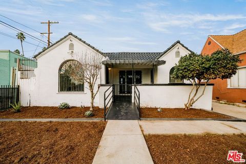 Photo of 613 E 76th Place, Los Angeles, CA 90001 (MLS # 25625485)