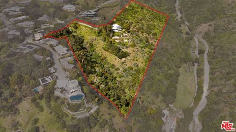 Photo of 1406 N Kenter Avenue, Los Angeles, CA 90049 (MLS # 26662245)