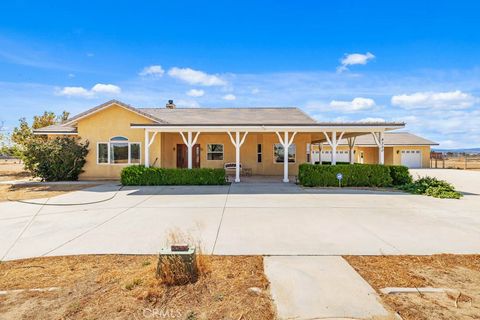 Photo of 8320 W Avenue D10, Lancaster, CA 93536 (MLS # SR25243537)