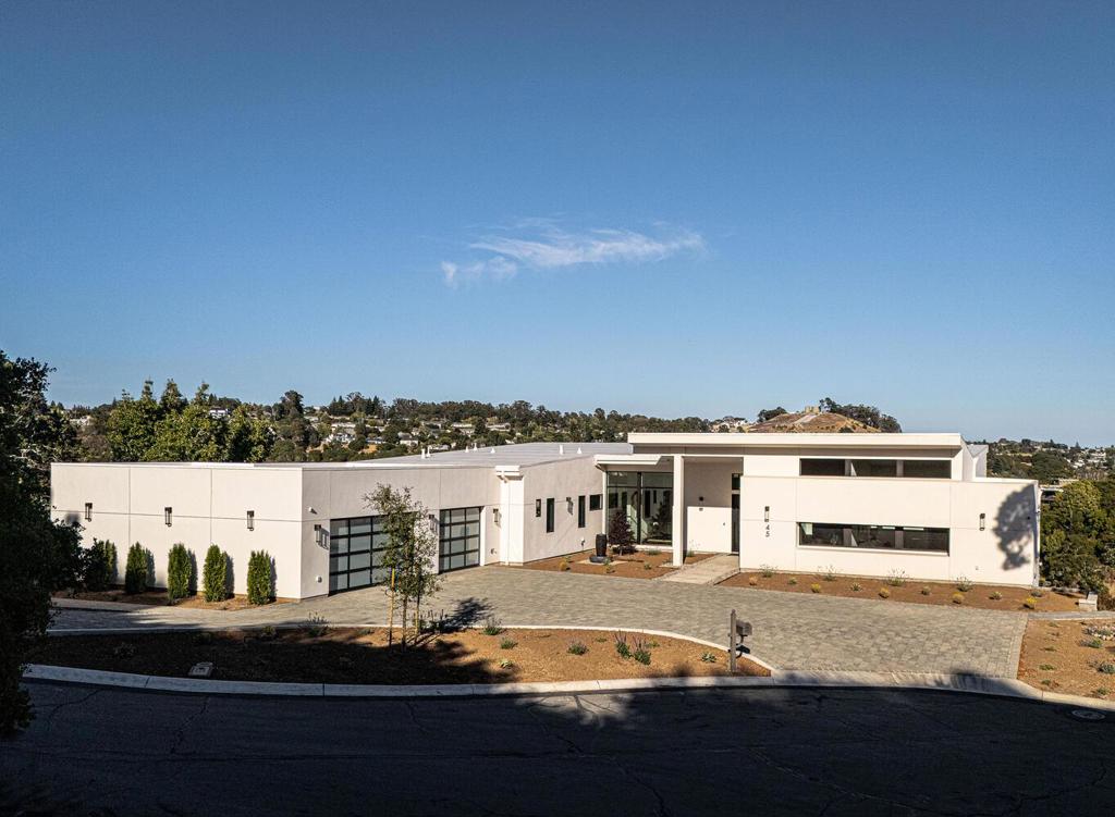 Welcome to 45 Calaveras Court, a brand-new modern masterpiece nestled in the Hillsborough hills. Located at the end of a private cul-de-sac on a sizable 4-acre lot, this stunning residence offers approximately 7,000 square feet of elegantly designed living space. Enjoy unobstructed canyon views from every window, providing a breathtaking backdrop to your everyday life. Step inside to discover soaring ceilings that create an open and inviting atmosphere, complemented by an abundance of natural light that fills every corner. The expansive first floor features a massive entertainment deck, perfect for hosting gatherings or simply relaxing amidst nature. With a total of 8 bedrooms, including master suites on each level, this exceptional home is perfect for large families or multi-generation living.