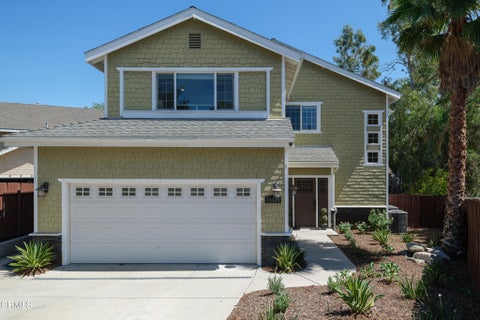 Photo of 10128 Golden Oaks Avenue, Los Angeles, CA 91042 (MLS # P1-28632)