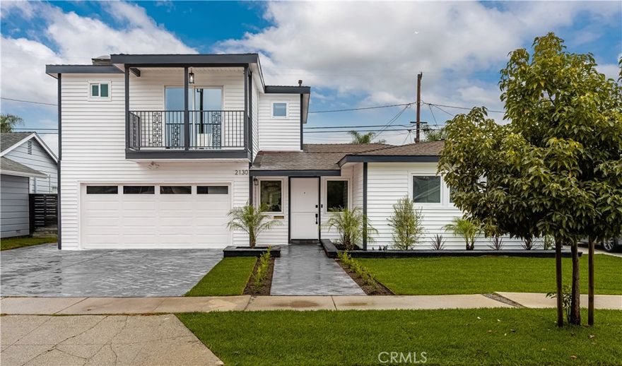 This newly completed, fully permitted remodel offers the comfort and ease of near–new construction in a prime Long Beach location. The home features two full primary suites and a thoughtfully reconfigured floor plan, ideal for comfortable and flexible living. Recent upgrades include new electrical, plumbing, lighting, drywall, doors, and windows. The modern kitchen showcases premium cabinetry, sleek finishes, and an open layout suited for everyday living and entertaining. Bathrooms are finished with stylish tilework and upscale fixtures, and new flooring throughout provides a clean, cohesive aesthetic. Additional features include whole-home water filtration, dual A/C units, owned solar panels, and tankless water heaters—enhancing efficiency and comfort while helping reduce utility costs. Located just a short walk to El Dorado Park, the home offers easy access to walking and biking trails, lakes, sports facilities, and open green space. Conveniently close to nearby hospitals, CSULB, shopping, dining, and major commuter routes, and situated within a highly regarded school district. A rare opportunity to lease a beautifully updated home with modern systems in one of Long Beach’s most desirable neighborhoods.