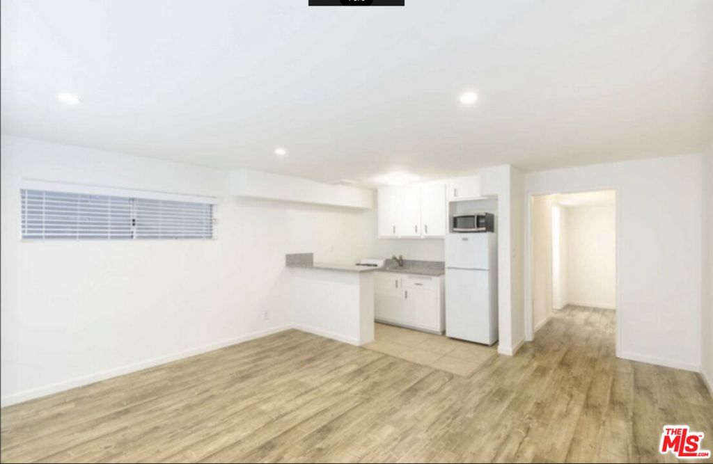 Welcome to Laurel Ave, one of West Hollywood's most sought after streets, where you will find this tasteful studio apartment with a full kitchen and appliances, one bathroom, modern updates, and parking. Enter into the spacious open floor plan with wide plank engineered floors throughout. Enjoy the fully equipped kitchen, including prep space, breakfast bar, dishwasher, refrigerator, gas range, and microwave. Modern countertops and LED recessed lighting complete the ambiance. Enjoy ample storage and closet space along with a large bathroom. Enjoy the extra large patio space and privacy. Unit comes with 1 parking spot and laundry is located in the community laundry room. Complex has undergone a full restoration, including completion of mandatory earthquake retrofitting, new plumbing, freshly painted exterior, common areas, and more.