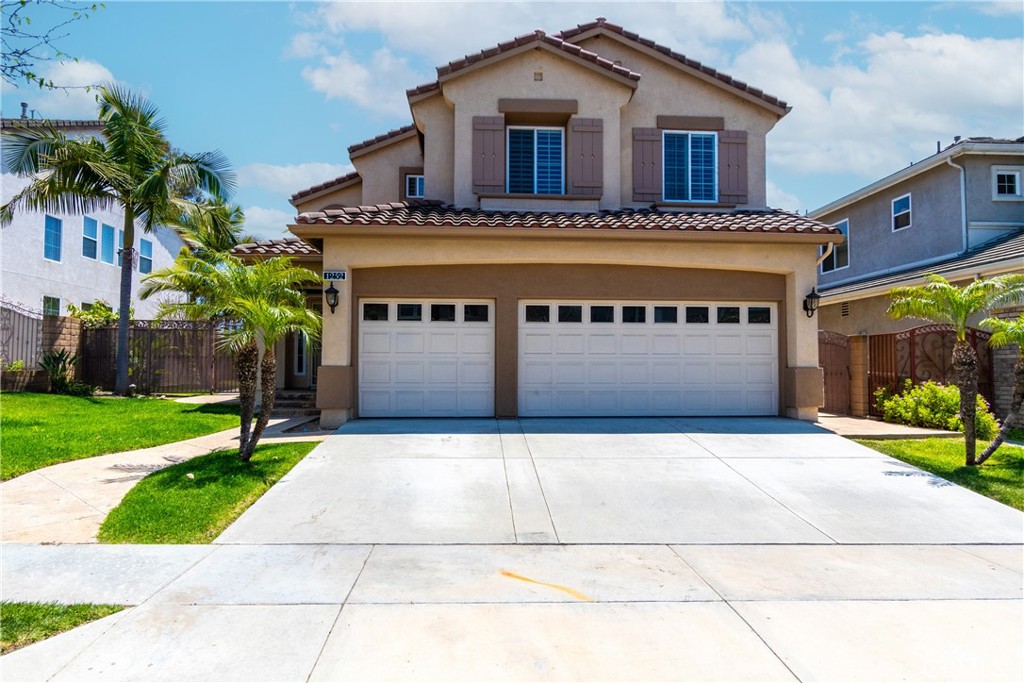 This is an immaculate property with true pride of ownership. A stunning experience begins as you enter through the foyer into the high-ceiling, travertine-floored living room. The stately, curved staircase leading to the open hallway, and the bright and open architecture make this home's first impression nothing less than dramatic. The kitchen is spotless, with beautiful cabinets and granite counters. The travertine continues through the kitchen into the open family room. The backyard is entertainer's delight, with plenty of room for parties, and an inviting Pebble-Tech pool, complete with grotto-covered spa, waterfall and waterslide. The master bedroom has dual walk-in closets and, of course, granite over designer cabinets, a spa-tub and separate shower. There are three more bedrooms upstairs, and one bedroom downstairs for a total of five. There is also a spacious laundry room that includes a sink. A three-car garage completes this magnificent estate in the quiet Rosecrest development.