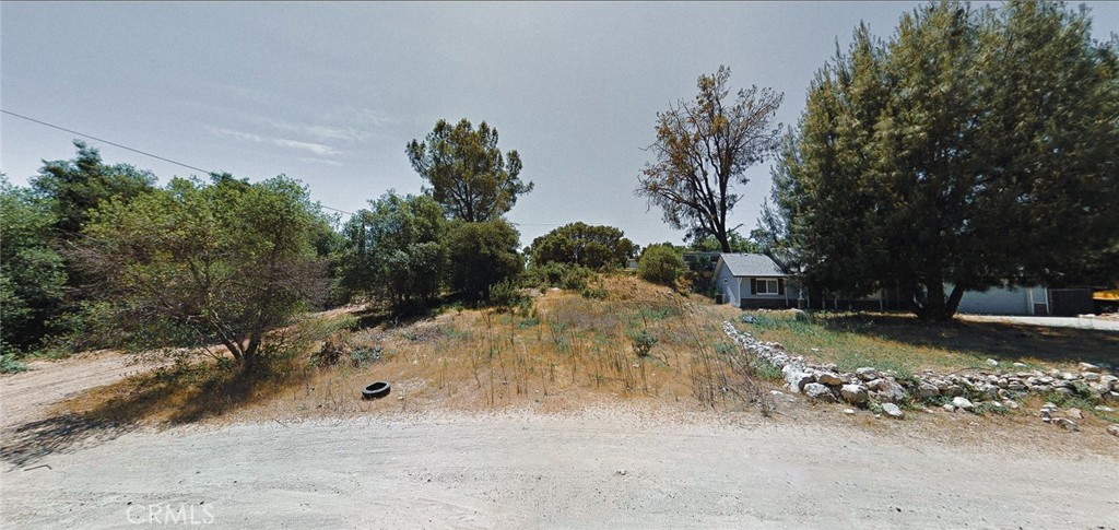 This large corner lot is an ideal spot for those seeking a peaceful setting close to Clearlake, California's largest natural lake. The property offers proximity to schools, shopping, and dining, making it a convenient choice for potential development.
Electricity available on the street, water provided by Golden State Water Company – Clearlake, and propane available. Septic installation required.
• Access: Located on a dirt road for a rural touch with easy access to town amenities.
A soil analysis has been completed and is on file with Environmental Health. Buyers are advised to confirm all utility availability and building requirements during the inspection period.
GPS coordinates-38.970825 -122.654718