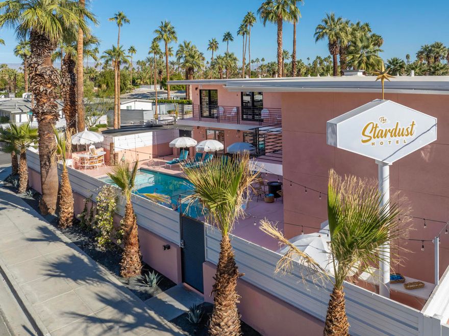 Step Back in Time -- A Vintage-Inspired Boutique Hotel in the Heart of Palm SpringsOriginally opened in 1956, this historic Palm Springs hotel is a rare gem where vintage soul meets modern luxury. Newly reimagined and lovingly restored, it pays homage to its mid-century roots while delivering the elevated comforts today's travelers expect.Now recognized as one of the highest-rated boutique hotels in Palm Springs, the property features 9 meticulously appointed guest rooms -- including two fully equipped ADA rooms and one expansive two-bedroom suite -- offering flexibility, sophistication, and broad guest appeal. It's the ideal setup for group buyouts, extended stays, or multifamily use.The hotel recently underwent a $1.85 million top-to-bottom renovation, completed within the past six months. Every detail was thoughtfully curated -- blending nostalgic charm with high-end finishes across both interiors and exteriors.Prime Location, Iconic NeighborsCentrally situated just steps from Palm Springs' most iconic dining and nightlife -- including Bar Cecil, Mr. Lyons, Seymour's, and Gigi's -- the hotel places guests at the beating heart of the city.Mountain Views + Resort-Like AmenitiesFrom the upstairs suites, wake to stunning mountain views -- visible right from your bed. At the center of the property, a sparkling pool anchors the communal space, flanked by a fire pit, BBQ area, lounge chairs, and outdoor dining tables. It's a natural gathering place from morning coffee to twilight cocktails.Thoughtful Comforts in Every RoomEach room features large spa-like bathrooms with luxurious rain showers, Casper mattresses for exceptional sleep, ROKU-enabled smart TVs, and distinctive vintage artwork that adds charm and character. Special touches are found throughout, creating a memorable and immersive guest experience.Indoor Lounge + Commercial KitchenA spacious ground-floor lounge offers additional flexibility for group breakfasts, catered events, or corporate gatherings. It includes an oversized kitchen outfitted with commercial-grade appliances -- ready to handle everything from casual brunches to full-service receptions.Upside Potential: Type 80 Liquor LicenseFuture owners may explore securing a Type 80 Bed & Breakfast liquor license, allowing for on-site beverage service folded into the nightly rate -- enhancing guest satisfaction and unlocking additional revenue streams.An Ideal Venue for Buyouts, Celebrations, and RetreatsWh