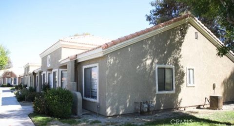 Photo of 40900 Breezy Pass Rd #D, Palm Desert, CA 92211 (MLS # SB26083894)