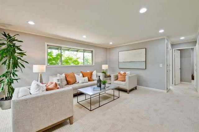 OH Sun 1:30 -3:30 Pm. Offer review 8/28/25. Welcome to this beautifully updated upper-level 2-bedroom, 1-bath condo nestled in a quiet, tree-lined community near vibrant Downtown Campbell and top-rated schools. This inviting home features a bright and functional floor plan with newer flooring, recessed lighting, dual-pane windows, and a sliding door that opens to your own private balcony - perfect for morning coffee or evening relaxation. The remodeled kitchen is equipped with warm wood cabinetry, granite countertops, and a modern design that makes cooking a joy. The stylish bathroom offers dual sinks and contemporary finishes for added comfort and convenience. Enjoy the benefits of a well-maintained community with HOA coverage that includes water, sewer, garbage, earthquake insurance, exterior maintenance, landscaping and common area utilities. Dedicated carport parking is included. Located just minutes from the Pruneyard, Santana Row, Valley Fair Mall, parks, and major commuter routes including Hwy 280, 880, and San Tomas Expressway, this home offers the perfect blend of comfort, convenience, and community. Don't miss this wonderful opportunity to own in one of Campbells most desirable neighborhoods! Virtual staging.