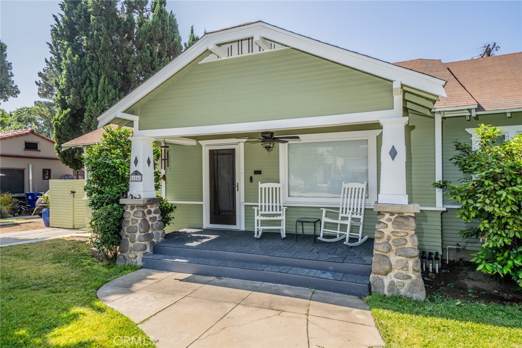 Elegant 1918 Craftsman Reimagined – Luxury Living in Ontario’s Historic District with Designer Finishes & Private ADU. Step into timeless sophistication with this masterfully restored 1918 Craftsman, where vintage charm meets contemporary luxury. Situated on a picturesque tree-lined street in Ontario’s premier historic neighborhood, this exceptional residence was fully renovated down to the studs in 2023, delivering high-end comfort, premium materials, and refined design throughout. Main Residence – Approx. 1,400 sq. ft. of Curated Living Space. This 3-bedroom, 2-bath home has been thoughtfully redesigned with no expense spared: Top-to-bottom electrical overhaul with premium finishes. All-new PEX plumbing, updated fixtures, and under-house lines replaced. Energy-efficient enhancements including blown-in insulation and dual-pane windows with custom blinds. Central air and heat installed in 2024 for optimal climate control. Designer interior upgrades: luxe two-tone paint, hand-textured walls, and high-end luxury vinyl plank flooring. Chef’s kitchen with sleek white shaker cabinetry, granite countertops, and smart color-changing recessed lighting—perfect for entertaining. Spa-inspired bathrooms, including a serene soaking tub for indulgent relaxation. Tankless water heater provides endless hot water. Covered outdoor patio offers a serene setting for alfresco dining or lounging. Lush backyard orchard with citrus and avocado trees adds privacy and elegance. Private ADU – Approx. 400 sq ft of Flexible Luxury. Beautifully finished detached garage conversion with: Private entrance, Full bathroom, Built-in Murphy bed for elegant space-saving, Plumbing prepped for a future kitchenette. Perfect for guests, extended stays, creative studio space, or boutique rental. Where historic craftsmanship meets modern elegance, this turnkey estate offers rare versatility and sophisticated living in one of Ontario’s most sought-after enclaves. Opportunities like this are truly rare—schedule your private showing today.