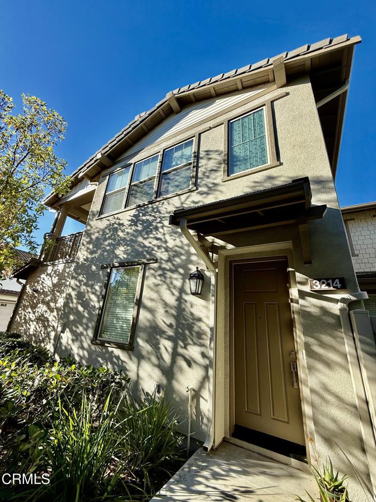 Welcome to beautifully and newly developed Riverpark! Riverpark at The Collection is considered one of Ventura county's most desired and complete lifestyle communities featuring dining, shopping, parks and entertainment all in one and within a walking distance. You will find it all here. This is a unique opportunity to own this beautiful two-story home where all of the living spaces, kitchen and bedrooms are on one level. This end unit townhome feel-like property features high ceilings, lots of natural light, air conditioning and open floor plan concept. On the second level, you will find spacious living room, kitchen, granite countertop island for entertainment, dining area and adjacent outdoor balcony for BBQ and your enjoyment. There are 3 bedrooms  and two full baths. Flooring is upgraded to wood-look waterproof laminate flooring. There is fresh paint throughout the unit. Kitchen features granite countertops, stainless steel appliances, extra-large single-basin stainless sink, island and pendant lights. Enjoy a convenience of the private two-car garage with lots of storage room cabinets, tankless water heater, epoxy covered floor and gym equipment. Garage leads directly into the first level main entrance and a staircase that takes you to second level. There is a recessed lighting throughout the whole unit and surround sound system already wired in. Washer, dryer, wall mounted TV, gym equipment and refrigerator are included in lease for your convenience. Furniture shown on photos can either stay or go depending on your personal preferences. Pets are not allowed.