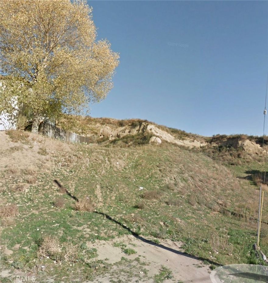 Beautiful residential lot in high demand area of Val Verde, California. Located in the serene surroundings of Val Verde, California, this 5914 square feet vacant lot offers boundless potential for future development. Nestled amidst picturesque mountains, this prime piece of real estate provides a tranquil retreat while being conveniently situated just 5 minutes from the 5 Freeway and 5 minutes to the 126 Freeway, ensuring easy access to nearby amenities and transportation routes. Enjoy the convenience of proximity to shopping centers, with the added bonus of being a mere 10 minutes away from the excitement of Magic Mountain. Don't miss this opportunity to invest in your dream development project in this idyllic location. Buyer to do his own due diligence. Contact us today for more information! OWNER WILL CONSIDER CARRYING ON PAPER!