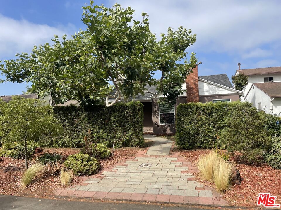 Beautiful home in Westside Village with A GREAT VIEW. Beam living room ceiling with fireplace. Move-in condition, 3 bedroom 2 bath with den/family room. All appliances are included. Have your morning coffee on a large elevated deck and take in the spectacular view to start your day. All on a beautiful, quiet, tree-lined street. 2-car garage with private alley access. Conveniently close to parks, transportation, schools, and shopping. Very easy to show.
