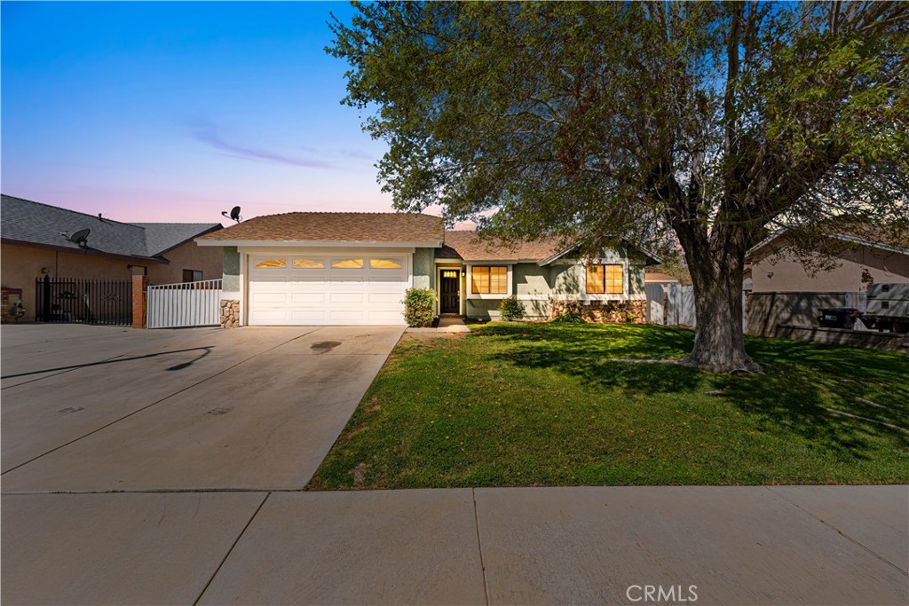 Charming Single-Story Gem in Palmdale
Welcome to this beautifully maintained single-story residence in a desirable Palmdale community. This lovely 1,045 square foot home features New roof, three comfortable bedrooms and two well-appointed bathrooms, creating the perfect balance of space and comfort.
Recently refreshed with new paint, this residence radiates pride of ownership at every turn. The thoughtfully designed kitchen showcases elegant granite countertops with refined square edges complemented by crisp white cabinetry. Each room offers generous proportions, ensuring comfort for everyone in the household.
One of this property's standout features is its expansive lot with dedicated recreational vehicle access. The cemented side area provides exceptional versatility—ideal for maintenance-free outdoor entertaining or additional vehicle storage. The backyard presents numerous possibilities for outdoor enjoyment, gardening enthusiasts, or simply relaxing under the California sun.
Nature lovers will appreciate the proximity to William J. McAdam Park, just a short distance away, offering green spaces and recreational opportunities for all ages.
Perfectly positioned near shopping conveniences while maintaining a peaceful neighborhood atmosphere, this residence represents an excellent opportunity for first-time homeowners or those looking to simplify their lifestyle without sacrificing quality.
With its single-level layout, spacious rooms, and thoughtful features, this home strikes the perfect balance between functionality and comfort—a place where memories are waiting to be made. Don't miss your opportunity to make this delightful Palmdale property your own!