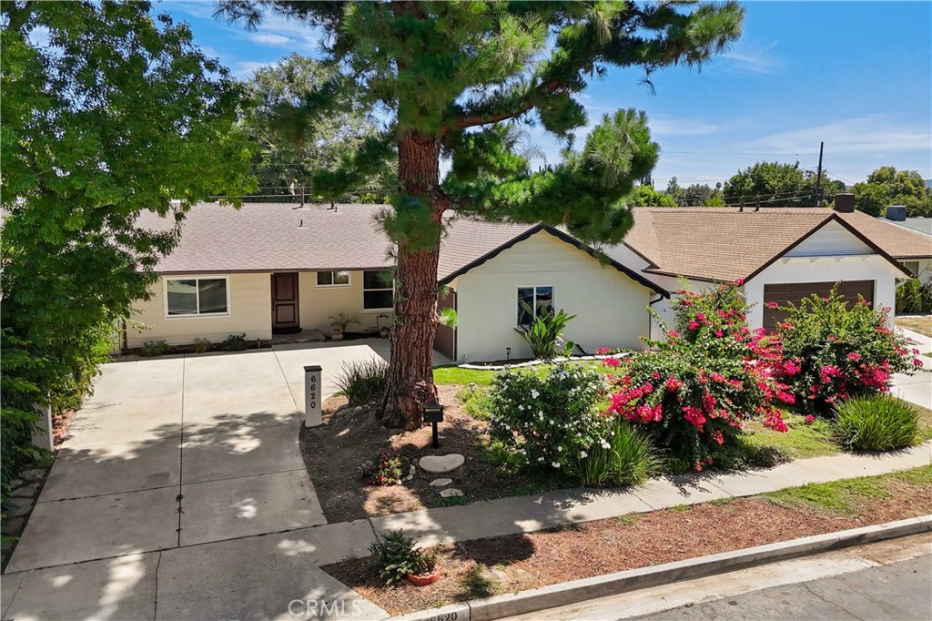 Experience Sophisticated Living in This Impeccably Remodeled West Hills Residence. This beautifully remodeled 3-bedroom, 2-bath residence offers 1,570 sq. ft. of thoughtfully designed living space on a spacious 7,432 sq. ft. lot. Step inside to a bright and inviting living area that seamlessly flows into the modern kitchen, featuring a smart sink, wine cellar, and brand-new stainless steel appliances. The kitchen provides direct access to the laundry area for added convenience. The bright family room opens seamlessly to the kitchen and showcases views of the backyard and pool, complemented by an upgraded, cozy fireplace for the perfect indoor-outdoor living experience and creating a warm and inviting centerpiece for gatherings. The home has been upgraded throughout with waterproof vinyl flooring, recessed lighting, and smooth ceilings, upgraded electrical panel and upgraded plumbing for enhanced efficiency and reliability. Both bathrooms have been tastefully remodeled, The home offers spacious bedrooms enhanced with double-pane windows and upgraded closet doors, providing both comfort and modern style. The expansive backyard is perfect for entertaining, complete with a sparkling pool and generous patio space for gatherings. Ideally located within a top-rated school district and close to The Village, Fallbrook Mall, Calabasas Commons, shopping, dining, and entertainment. This home combines modern finishes, quality upgrades, and an ideal location in the heart of the West Hills.