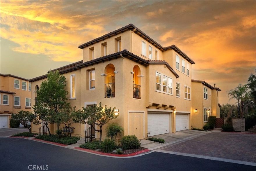 Welcome to 27017 Fairway Lane, a Modern Masterpiece in Cypress Point with NO Mello Roos. Experience contemporary living at its finest in this fully remodeled 2-bedroom, 2-bath, 1,573 sq. ft. home, showcasing exceptional craftsmanship, premium finishes, and thoughtful design throughout. Upon entry, a spacious foyer welcomes you and provides direct access to the two-car garage, which includes overhead storage and plenty of space for organization. The main living area features soaring two-story vaulted ceilings, a sleek Cosmo fireplace, and elegant custom wide plank wood flooring. The open floor plan flows effortlessly into the dining area and a chef’s kitchen designed for both style and performance. The kitchen is equipped with Miele built-in refrigerator and coffee/espresso machine, Wolf stovetop, oven, and microwave, and a Bosch built-in dishwasher. Arc Linea custom cabinetry with Sige inserts adds a sophisticated European touch, while custom oversized tile enhances the clean, modern aesthetic. The main level includes a spacious bedroom and a fully remodeled bathroom with laundry, featuring a custom one-of-a-kind wood countertop that adds warmth and natural beauty. Upstairs, the luxurious primary suite serves as a private retreat with a spa-like bathroom that includes a Produits Neptune soaking tub, separate shower, dual sinks, and a custom wood vanity and built-in storage cabinet. The walk-in closet offers built-in organization, and remote-operated blinds from The Shade Store allow effortless control of natural light. The home is ideally positioned at the end of a quiet cul-de-sac, offering privacy and proximity to community amenities including two pools, two spas, children’s pools, clubhouse, picnic and barbecue areas, tennis and pickleball courts, basketball courts, and a park with playgrounds. Located near major shopping, dining, freeway access, and highly regarded schools, this home offers the perfect balance of modern luxury, comfort, and convenience. Experience the beauty of Cypress Point living at 27017 Fairway Lane! Where design and quality meet everyday comfort.