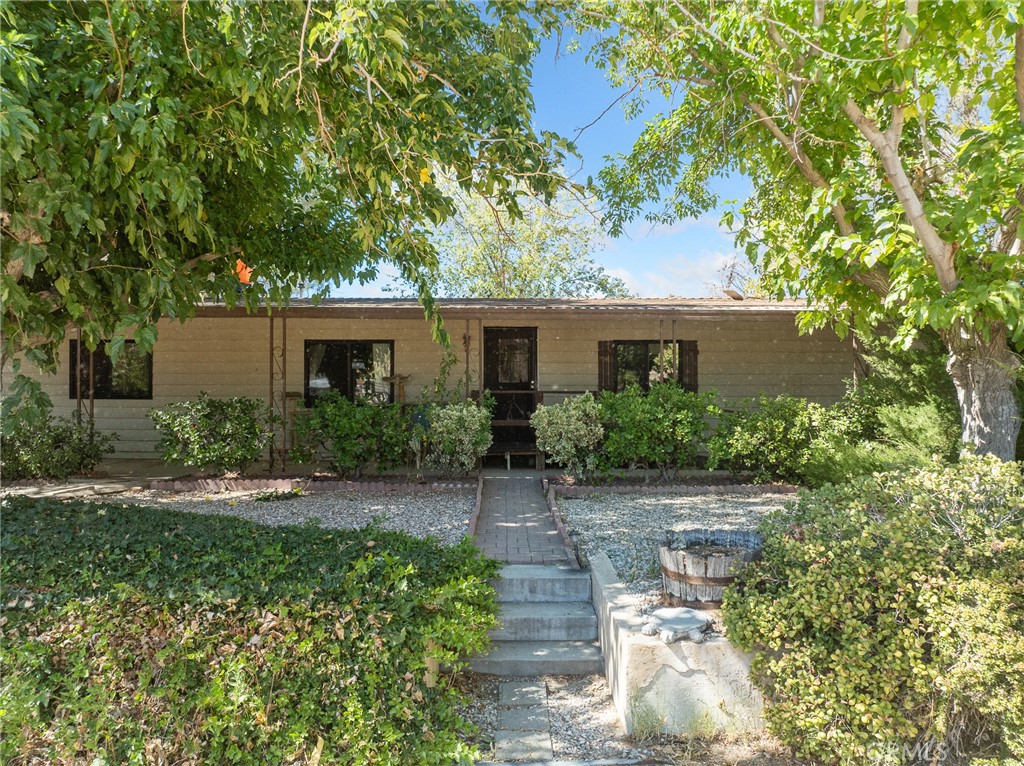Welcome to your equestrian dream property! Situated on just over 2 acres right off highly desirable Deep Creek Road, this horse property offers the perfect blend of private enjoyment and income opportunity. The centerpiece is a gorgeous barn that not only includes a spacious workshop but also a dedicated feed room, lights, hot water, and 4 fully equipped stalls. Horse lovers will appreciate the oversized tack room and thoughtful design throughout.
Currently set up as a boarding facility, the property has 21 stalls and features a large hay barn, wash rack, arena, and additional structures for flexible use. Whether you’re seeking a private retreat for your horses or want to continue generating income through boarding, this property is ready to accommodate your vision.And not to mention you can ride. off your property and enjoy hours of trail riding down in the riverbed.
Bring your horses, your business, or both—properties with this level of infrastructure and in such a prime location are rare to find!