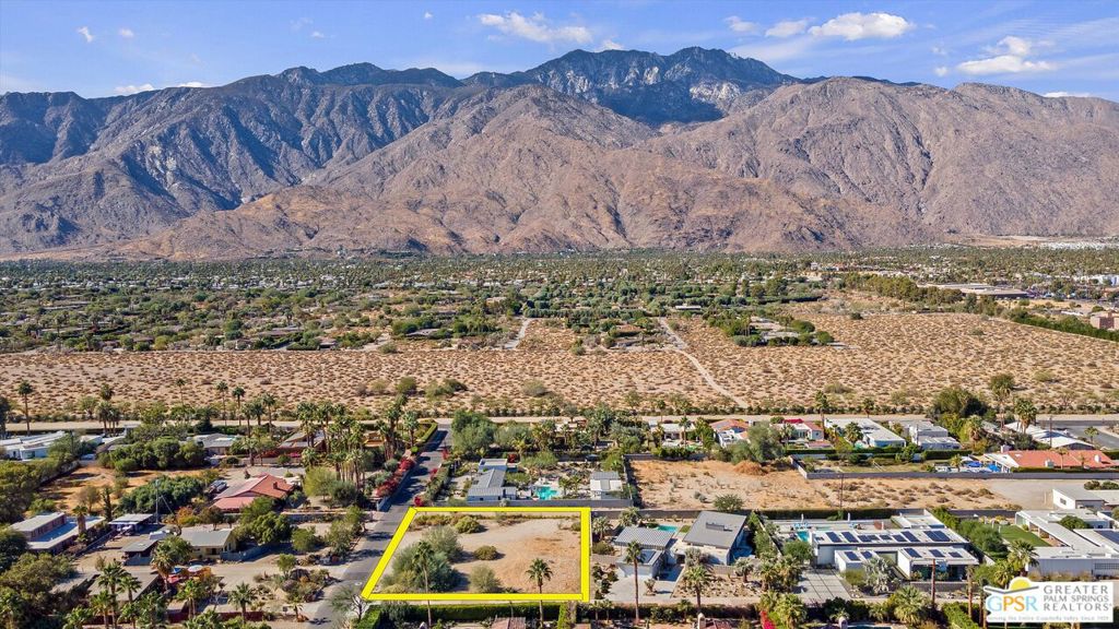 Here's a rare and special opportunity in Palm Springs. We are offering one of the last remaining flat, prime parcels of land in the highly sought-after Araby neighborhood. This over-half-acre lot boasts fabulous mountain views on three sides, creating the perfect backdrop for your future home. Situated at the corner of Anza Trail and Rancho Vista Trail, the property is the final site along Rancho Vista Trail, a street known for its collection of modern homes designed by renowned architects such as Lance O'Donnell and Jim Jennings. There is also the exciting possibility of acquiring plans for a fully realized home on this lot by architect Jim Jennings. Make your dream happen by building your dream home in one of Palm Springs' most desirable locations.