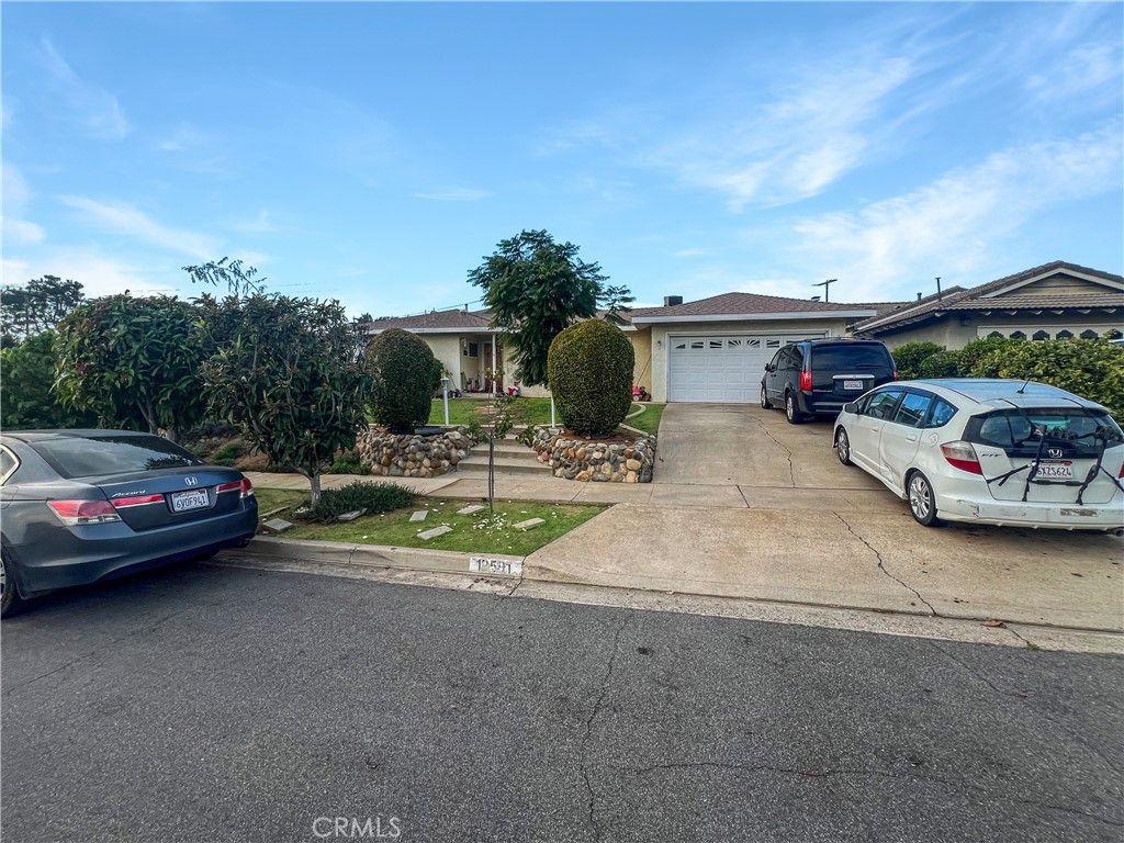 Photo of 12591 Charloma Dr, Tustin, CA 92780 (MLS # OC25270776)