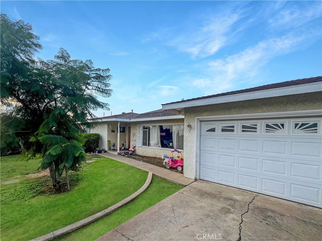 Photo of 12591 Charloma Dr, Tustin, CA 92780 (MLS # OC25270776)