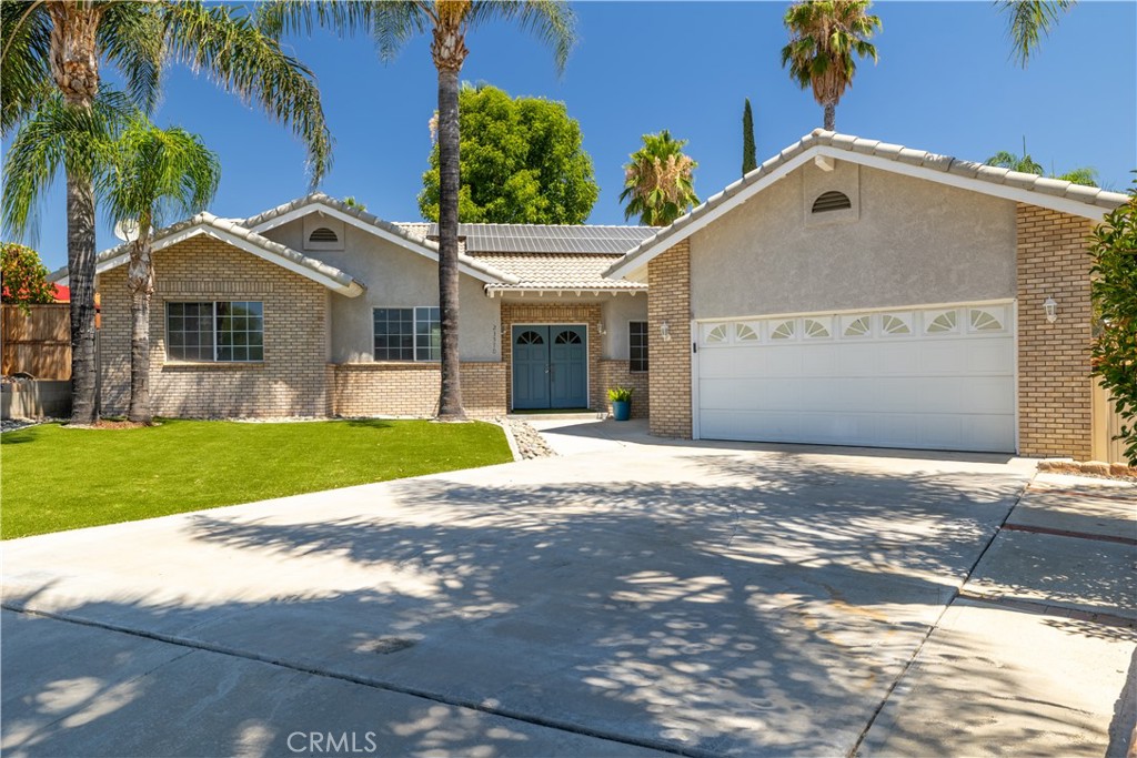 Welcome Home to Canyon Lake "A Little Bit of Paradise" Southern California's hidden gem offering Active Resort Style Living All Year Round for All ages. This charming single story home at the end of a cul de sac, is situated on a flat oversized lot with 2 car garage on the East side of the Lake. You are greeted into this home by a double door entry & open concept living space with family room & dining room with tile floors and a cozy fireplace as the focal point and is conveniently located just off the bright & airy entertainer's kitchen with stainless steel appliances, dark granite countertops, bar seating & an additional eating nook. A large slider leads to your stucco covered patio area offering indoor-outdoor living space all year round with a massive pool sized backyard with plenty of room to run & play. Back inside a wide hallway lined with linen storage cupboards leads you to a guest bathroom bathtub & stand up shower & two guest suites with crown molding. Along with a Private and roomy primary bedroom and luxurious bathroom await you with dual sinks in vanity & a garden tub perfect for soaking away your day. Canyon Lake is situated on a 400 acre lake with activities in the community for all ages. It is a Guarded and gated city offering resort style living year round with Boating & water sports of all kinds, Slalom/Jump Lagoons, Paddleboarding, Basketball, Pickleball, Tennis, Baseball Diamonds, Equestrian facility, Lake is Stocked with Catfish & Bass for Fishing, Marina, Sailing, Pontooning, Golf Course and Country Club Bar & Grill, Hiking, Birdwatching, Biking, Newly renovated lakefront Happy Camp/RV park, Indoor/Outdoor concerts at the amphitheater or Sunset Lounge at the Lodge overlooking the Jr Olympic heated saltwater pool. There are Holiday activities year round for kids and adults, Parades for all occasions, Dozens of Parks & Beaches, Senior Center, Holiday boutiques, Bingo, Car Shows, Clubs, Community Garden, Canyon Lake Fire Department, Amazing 4th of July Fireworks over the Lake and so much more for you to explore. Canyon Lake has three gates for entrance/exit & is conveniently located between the 15 & 215 Freeways which makes for an easy commute to Nearby beaches, airports Ontario & San Diego. In the winter, Mountain High,Big Bear and Mammoth Lakes for skiing & snowboarding season. Come and see what the Lake Life has instore for you! You can learn more & a 360 tour of the amenities on the Canyon Lake Property Owners website.