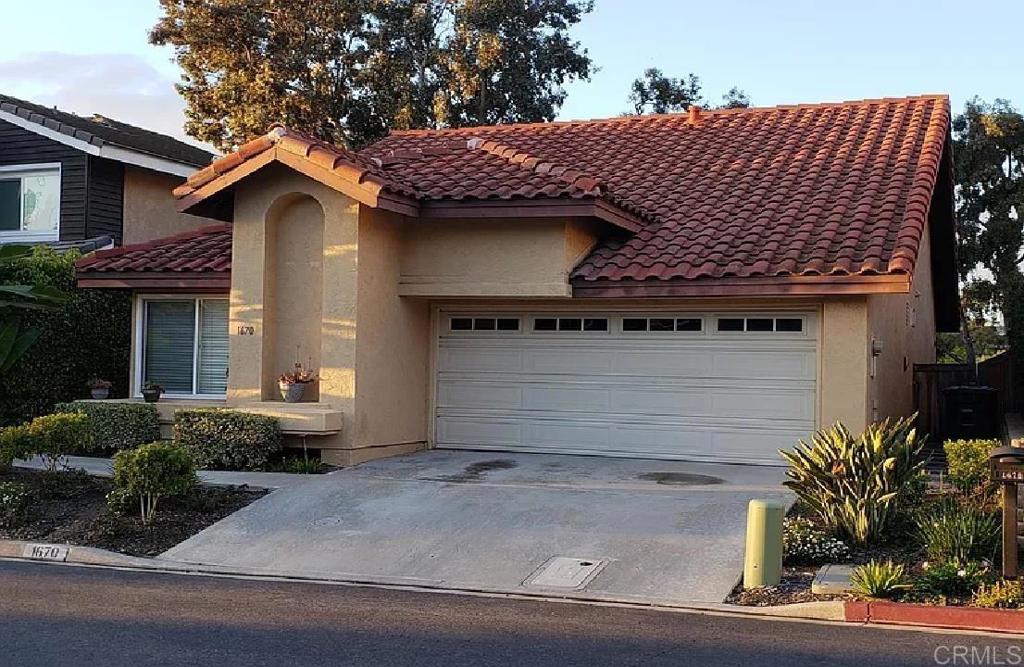 Welcome to 1670 Tennis Match Way in Encinitas—a beautifully designed home offering just under 1,500 sq. ft. of comfortable living space in one of Village Park’s premier neighborhoods. This residence features 2 spacious bedrooms, 2 full bathrooms, and a versatile loft currently being used as a third bedroom. With vaulted ceilings and an open layout, the home feels bright, airy, and inviting. The attached 2-car garage provides convenience and storage, while the community amenities—including a sparkling pool and tennis courts—offer a resort-style lifestyle right at your doorstep. Located just minutes from shopping, dining, and world-class beaches, this property combines convenience with coastal charm.