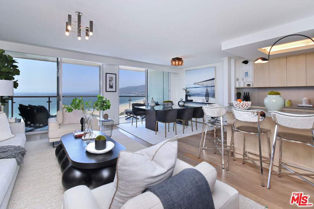 Incredible Malibu and Queen necklace views await you in this completely turn key 2 bedroom, 2 bathroom unit at Ocean Towers. As you enter the unit, you will be mesmerized by the head on ocean views, but the details in this unit are what make it even more special! No expense was spared in a complete renovation, including beautiful wide plank hard wood floors, Jason Koharik light fixtures, and automated black out shades. The kitchen has all top of the line Gaggenau appliances, a wine fridge and marble countertops throughout. Both bathrooms include Waterworks showers and fixtures, spectacular floor to ceiling marble and radiant heated flooring. Ocean Towers is located in the heart of Santa Monica, and is a full service building, with a 24 hour concierge and tons of amenities, such as a Pool & Spa, Sun Deck, Fitness Center, Library, Clubhouse, Conference Center and Valet Parking. ***Photos were taken when the unit was staged. Owner has since moved back into the unit after being displaced from the Palisades Fire and the unit is no longer staged.***